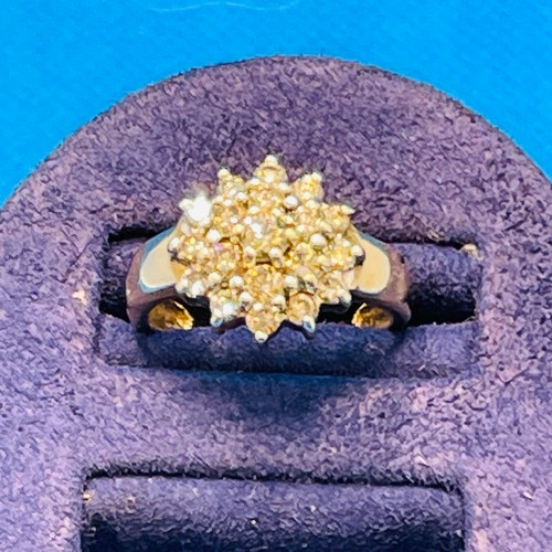 360 - 9CT YELLOW GOLD FLORET CLUSTER DIAMOND RING-ENCOMPASSING 19 DIAMONDS OF APPX 0.2CTS 3.27G SIZE L