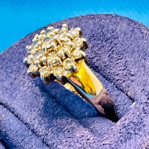 360 - 9CT YELLOW GOLD FLORET CLUSTER DIAMOND RING-ENCOMPASSING 19 DIAMONDS OF APPX 0.2CTS 3.27G SIZE L