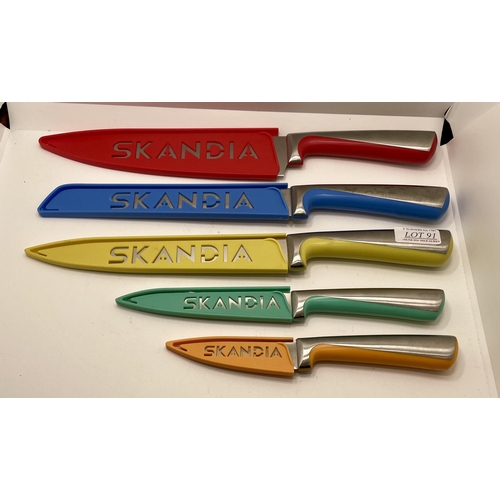 91 - SET OF 5 SKANDIA KITCHEN KNIVES WITH PROTECTIVE SHEATS - CHEF KNIFE/BREAD KNIFE ETC.