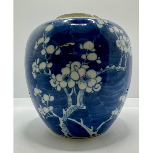 257 - A CHINESE BLUE & WHITE PRUNUS VASE -WITH SIGNES OF RPEAIR - H:19CMS