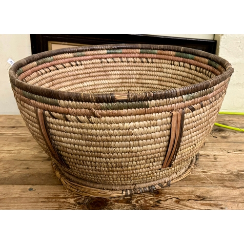 259 - CIRCULAR BASKET - PROBABLY AFRICAN, WITH 3 VINTAGE BASKETS,