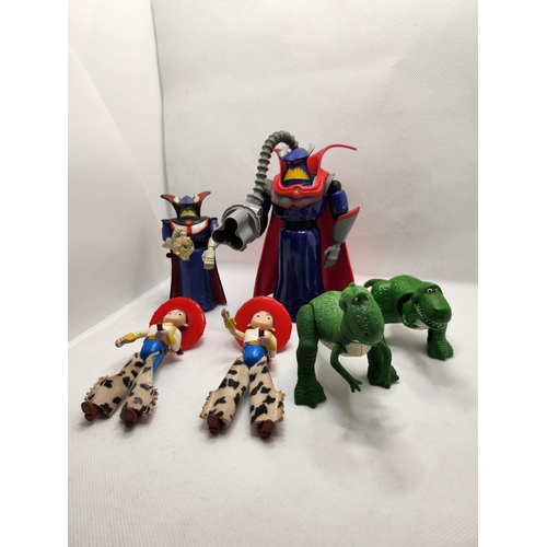 357 - TOY STORY 3 - 2 X WOBBLE HEAD DINOSAURS, 2 X JESSIE FIGURES, 2 X ZURG FIGURINES