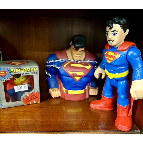 473 - SUPERMAN IN CHAINS MONEY BOX, SUPERMAN MATTEL FIGURINE AND A BOXED SUPERMAN BATH DUCK