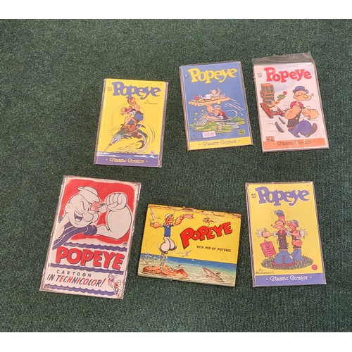 360 - VINTAGE POPEYE POP-UP BOOK, A REPRO. POPEYE METAL PLAQUE AND 4 X POPEYE CLASSIC COMIC BOOKS