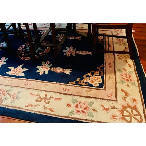 51 - A BLUE SUPERWASH PATTERNED RUG