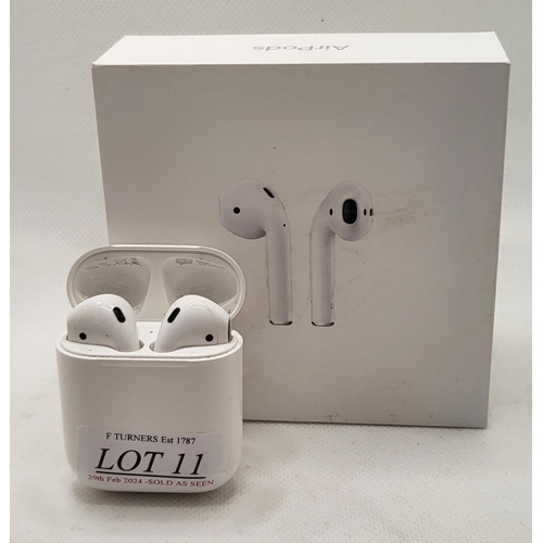 11 - BOXED PAIR OF APPLE AIRPODS IN CHARGING CASE WITH CHARGING WIRE - SHOWING SIGNS OF USAGE