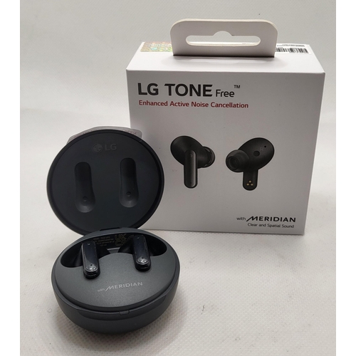 12 - BOXED PAIR OF LG TONE FREE WIRELESS EARBUDS IN CHARGING CASE WITH CHARGING WIRE