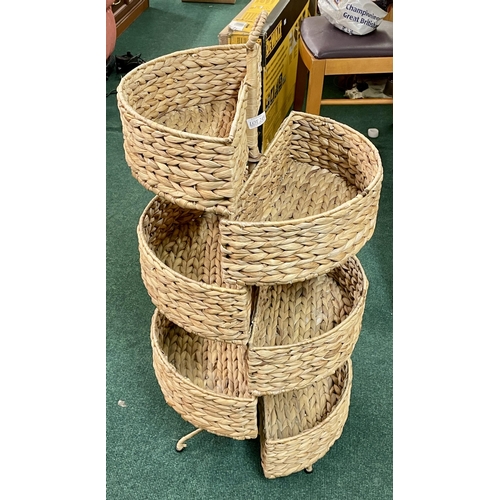 360 - A RATTAN 6 TIER HALFMOON STORAGE RACK ON 3 FEET H:90CMS TO HANDLE