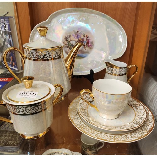 426 - A FINE CHINE GILDED LUSTER TEA SET COMPRISING OF TEAPOT, MILK JUG, CUP, SAUCER AND PLATE ETC....