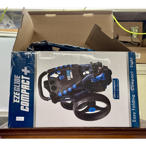 43 - BOXED EZEGLIDE COMPACT PLUS PREMIUM THREE WHEEL PUSH TROLLEY (FRONT WHEEL WILL NOT FOLD OUT)