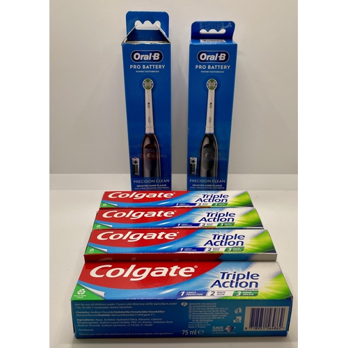 7 - SET OF 2 ORAL B PRO BATTERY POWER TOOTHBRUSHES TOGETHER WITH 4 X 75ML COLGATE TOOTHPASTE