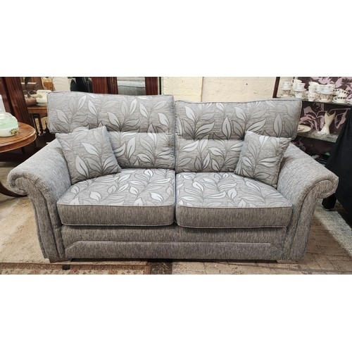 275 - GREY UPHOLSTERED REVERSIBLE 2.5-SEATER SOFA (ONE SIDE LEAF DESIGN AND THE OTHER SHADES OF GREY) WITH... 