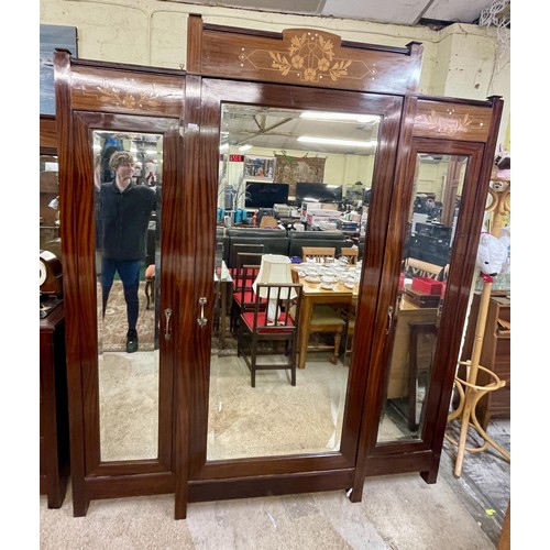 304 - AUSTRIAN ART NOUVEAU MAHOGANY FRUIT WOOD AND MOTHER OF PEARL INLAY TRIO MIRRORED WARDROBE, A LARGE M... 