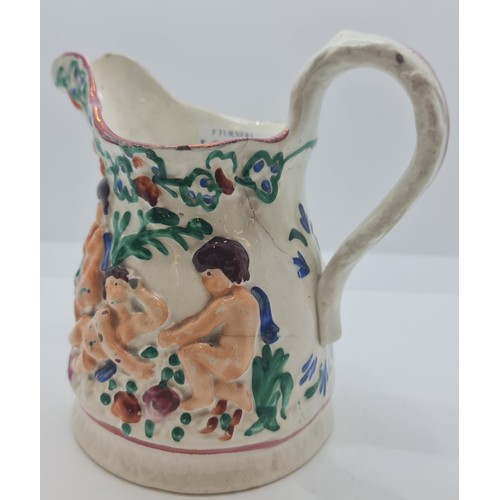 375 - VICTORIAN STAFFORDSHIRE JUG IN THE MANNER OF SWANSEA POTTERY DESIGNED WITH RECLINING CHERUBS C.1850