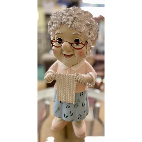 225 - A KNITTING GNOME FIGURE  - RESIN H:66CMS