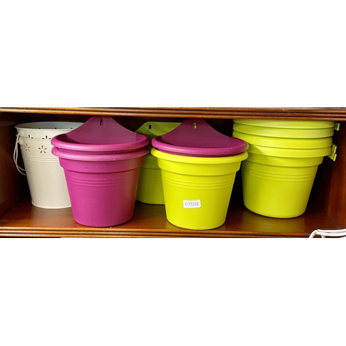 232 - 4X DRAINPIPE MOUNTED FLOWER TUBS, AND 9X FENCE MOUNTED FLOWER TUBS - (2X MED, 4X SMALL, 3X LONG)