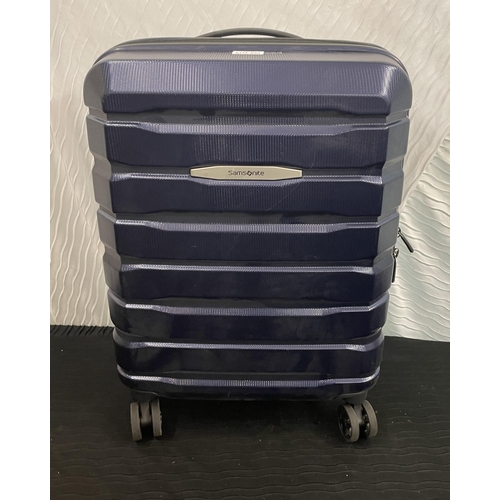 245 - SAMSONITE HARDSIDE CABIN SPINNER SUITCASE IN DARK PURPLE