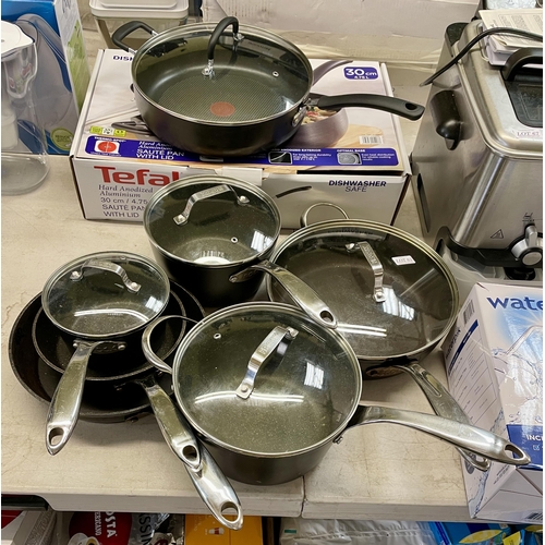 63 - 10 PIECE STARFRIT THE ROCK PAN SET - 6 PANS/4 LIDS - SOME PREVIOUS USEAGE TOGETHER WITH A BOXED TEFA... 