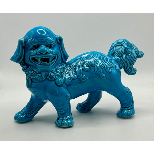 374 - CHINESE: A 20TH C. CHINESE TURQUOISE BUDDHISTIC LION - 15.5CMS (L)