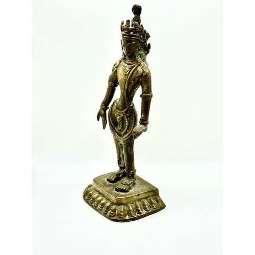 375 - A 19TH/20TH CENTURY INDIAN OR NEPALESE STANDING BRONZE DEITY, 21CM (H) POSS. 'AVALOKITESHVARA'