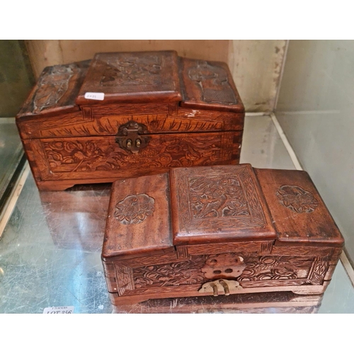 356 - 2 X CARVED ORIENTAL STYLE CADDIES/BOXES WITH BRASS LOCKS (ONE PART OF ONE LOCK MISSING)