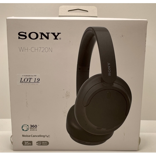 19 - BOXED PAIR OF SONY WH-CH720N NOISE CANCELLING OVER EAR HEADPHONES WITH CHARGING WIRE