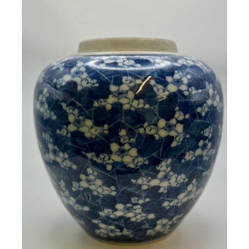 410 - AN ORIENTAL BLUE AND WHITE PRUNUS JAR, 14.1CM HIGH