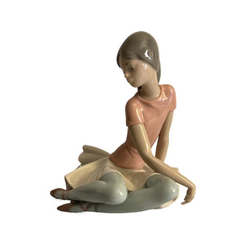 331 - TWO (2) LLADRO FIGURINES -LADY READING C.1978 - H: 15.5CMS (NB: TOE OF SHOE DAMAGED) AND LLADRO 1357... 