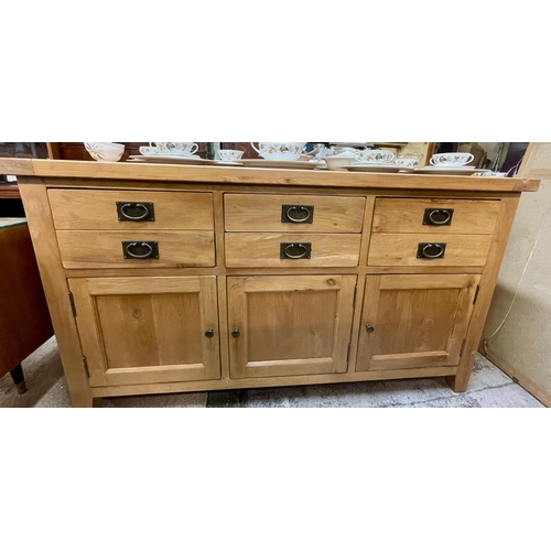 251 - OAK FURNITURE LAND SIDEBOARD - THREE DRAWERS/THREE CUPBOARDS TO BASE WITH SHELVES - 160CMW X 58CMD X... 