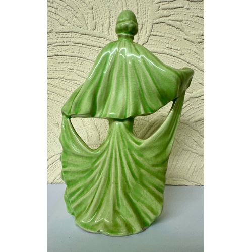 362 - A PALE GREEN GLAZED CERAMIC ART DECO DANCING FIGURE H.22CM NB: SMALL CHIP TO BASE AT BACK