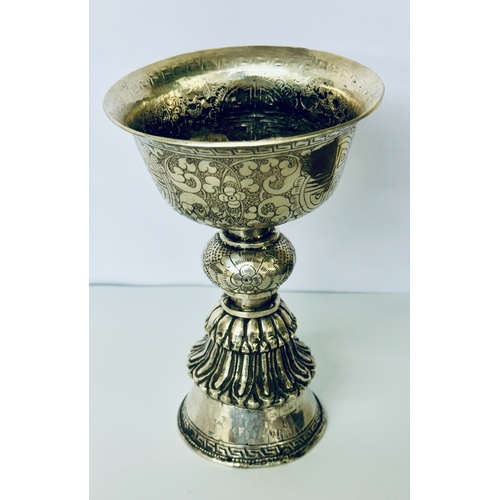 392 - TIBETAN GOBLET: AN OLD SILVERED METAL TIBETAN GOBLET H:14CMS