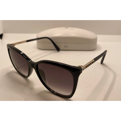 423 - A PAIR OF SWAROVSKI SUNGLASSES WITH ORIGINAL CARRY CASE - NOTE MISSING SOME DECORATION TO ARM