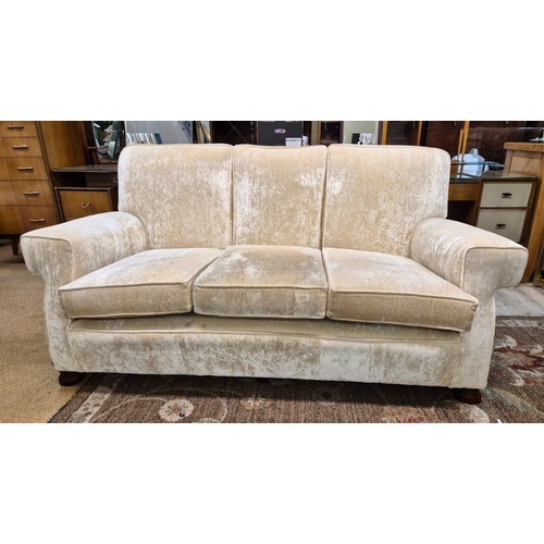 256 - A VINTAGE IVORY CRUSHED VELVET THREE PIECE SUITE - 3 SEAT SOFA, 2 ARMCHAIRS, 2 FOOTSTOOLS