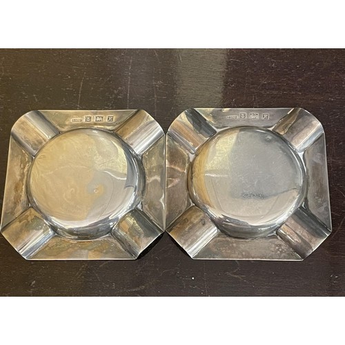 311 - A PAIR OF MATCHING SILVER ASHTRAYS - H/M BIRMINGHAM 1955 M/M D BROS  (61.2G), AND A CIGARETTE BOX AL... 