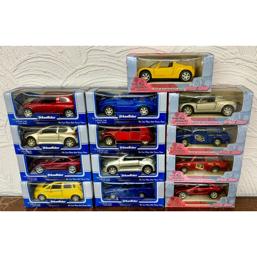 212 - BOXED URBAN RIDER DIE CAST METAL WITH PLASTIC PARTS -MODEL CARS - BLUE & RED BOXES)