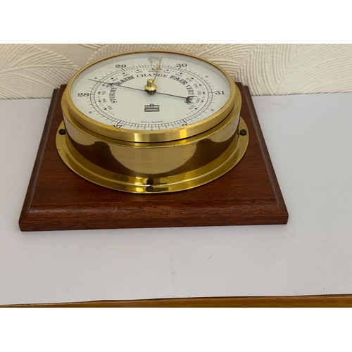 343 - SEWILLS OF LIVERPOOL: BRASS BAROMETER MOUNTED ON A HARDWOOD BASES - BAROMETER D:18CMS HARDWOOD BASES... 