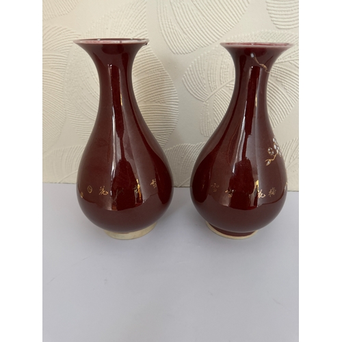 367 - A PAIR OF CHINESE RED GLAZED PORCELAIN VASES - RED SEAL MARK TO BASES H:22CMS