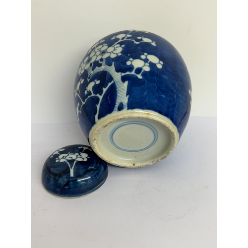 385 - A CHINESE BLUE & WHITE PRUNUS JAR & COVER LATE 19TH EARLY 20TH CENTURY BLUE TWIN RING MARK TO BASE-,... 