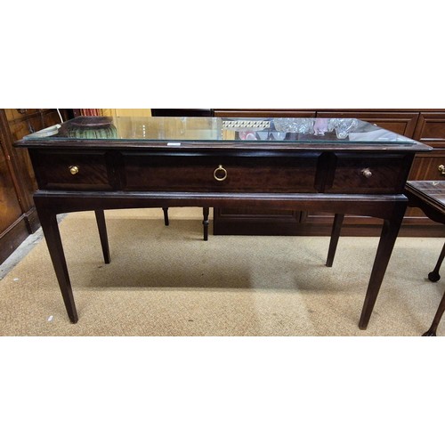 305 - A STAG 3 DRAWER CONSOLE/HALL TABLE WITH BRASS HANDLES AND FITTED GLASS TOP - 120CMW X 47CMD X 73CMH