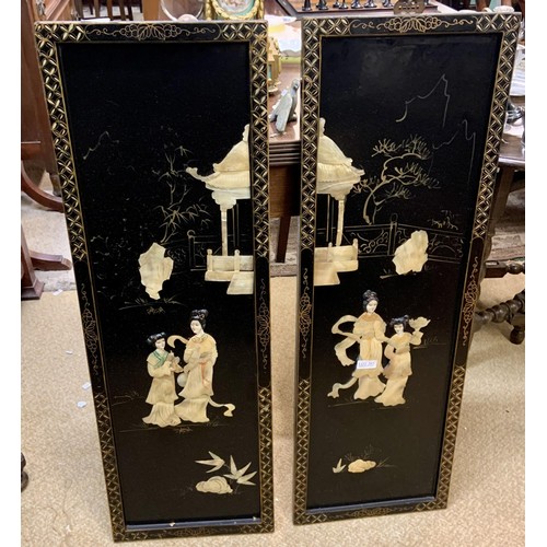 291 - A set of 2 Chinese hanging panels depicting Ladies by a pagoda temple,  - black lacquered with mothe... 