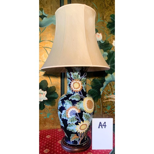 296 - CHINESE LAMPS -A PAIR OF SUNFLOWER PATTERN  ON DARK BLUE GROUND TABLE LAMPS WITH SHADES -APPROX. 86C... 