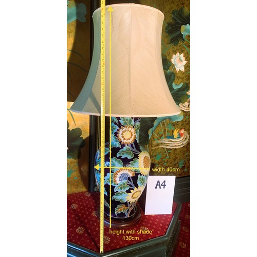 296 - CHINESE LAMPS -A PAIR OF SUNFLOWER PATTERN  ON DARK BLUE GROUND TABLE LAMPS WITH SHADES -APPROX. 86C... 