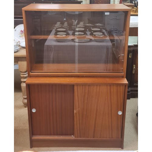 359 - TEAK MID-CENTURY SLIDING DOOR CABINET WITH BOOKCASE TOP