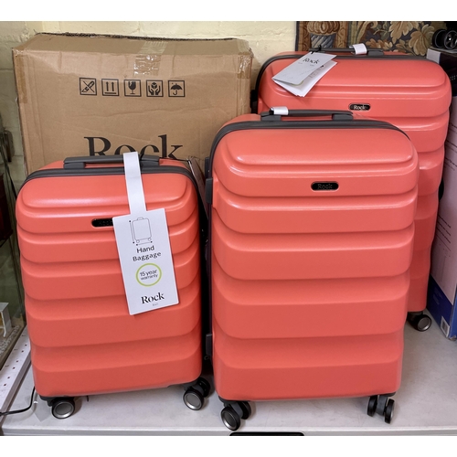 179 - BOXED 3 PIECE ROCK HARDSIDE SPINNER SUITCASE SET - LARGE/MEDIUM/HAND BAGGAGE - BALI - CORAL