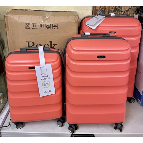 180 - BOXED 3 PIECE ROCK HARDSIDE SPINNER SUITCASE SET - LARGE/MEDIUM/HAND BAGGAGE - BALI - CORAL