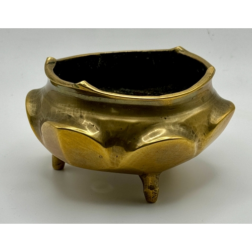 306 - A SMALL 19TH/20TH C. CHINESE POLISHED BRONZE TRIPOD CENSER, XUANDE MARK TO BASE 9CM WIDE