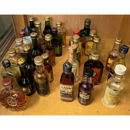 283 - A COLECTION OF VINTAGE MINIATURES - 12X RUMS VARIOUS AND 20 BRANDIES VARIOUS