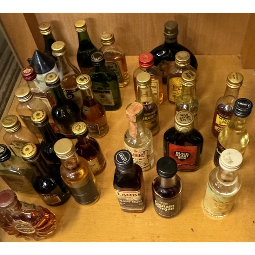 283 - A COLECTION OF VINTAGE MINIATURES - 12X RUMS VARIOUS AND 20 BRANDIES VARIOUS