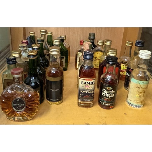 283 - A COLECTION OF VINTAGE MINIATURES - 12X RUMS VARIOUS AND 20 BRANDIES VARIOUS