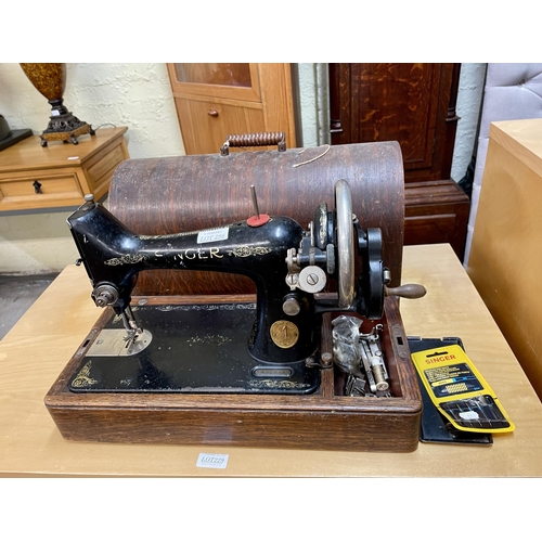 298 - A SINGER HAND OPERATED VINTAGE SEWING MACHINE WITH CASE AND SOME ACCESSORIES